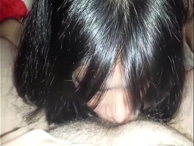 Asian amateur deepthroats a white cock looking sexy